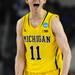 Michigan freshman Nik Stauskas reacts to a play on the court in overtime at Cowboys Stadium in Arlington, Texas on March 29, 2013. Melanie Maxwell I AnnArbor.com